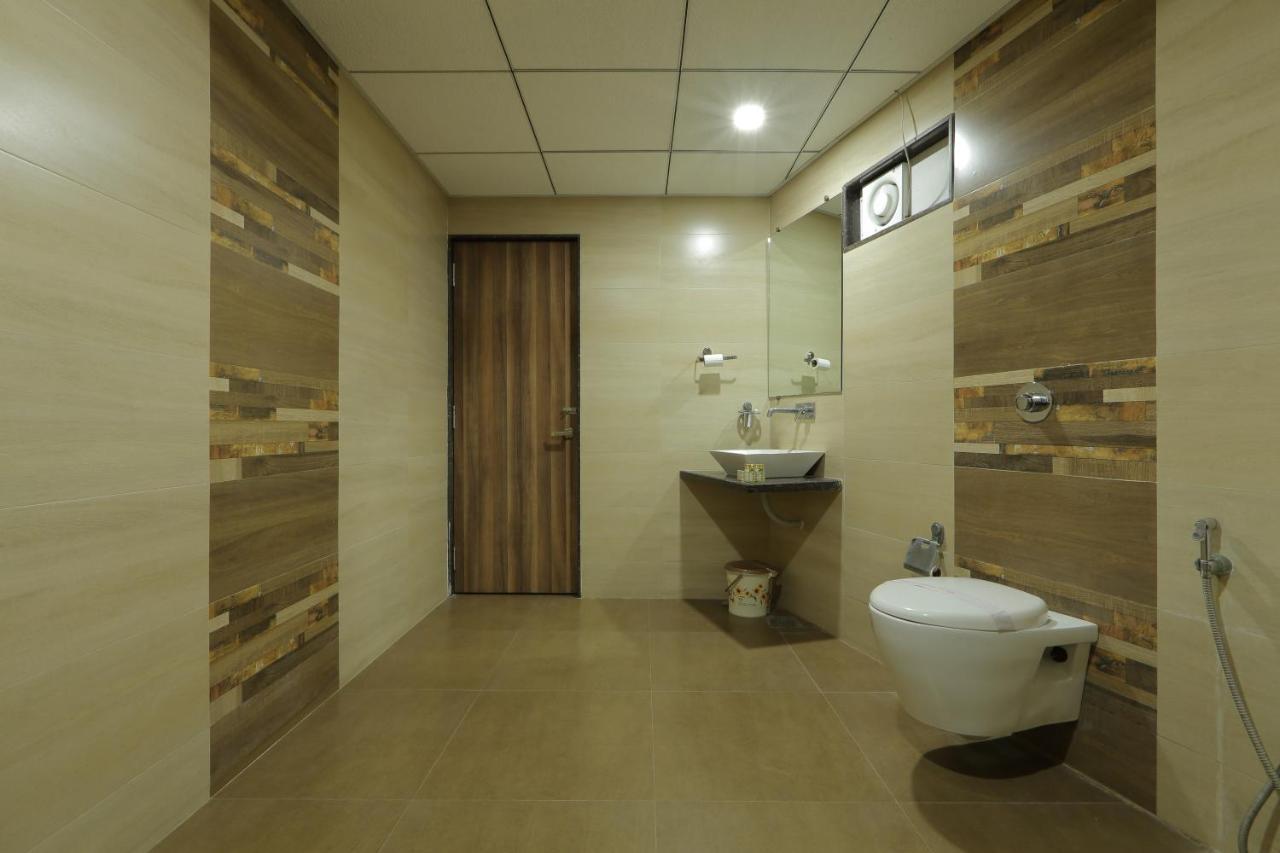 Hotel Unity อาเมดาบัด ภายนอก รูปภาพ